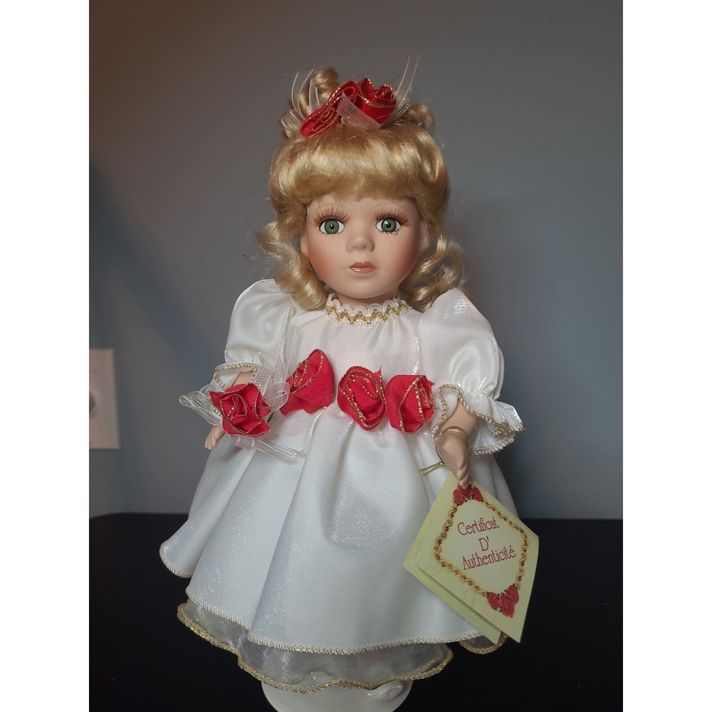Collectable Soft Expressions Doll white dress red ribbon